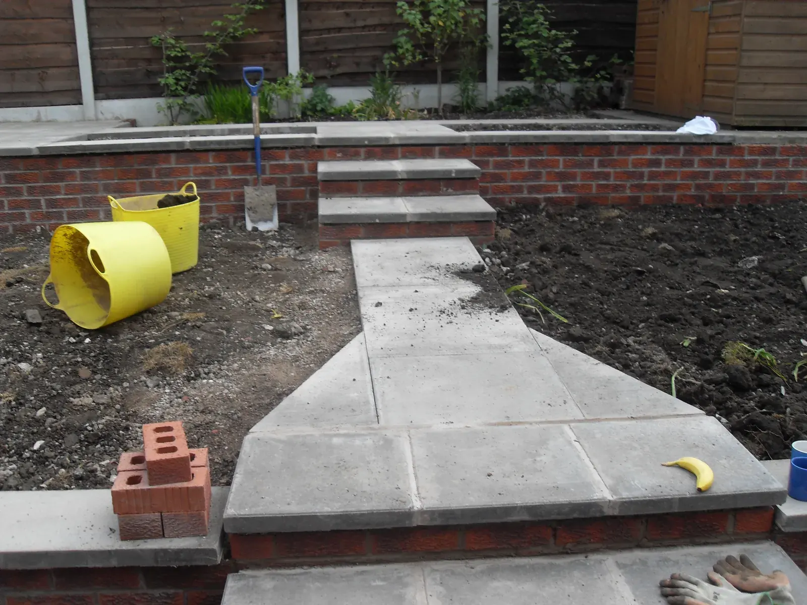 Concrete steps and path formed with brick edging detail