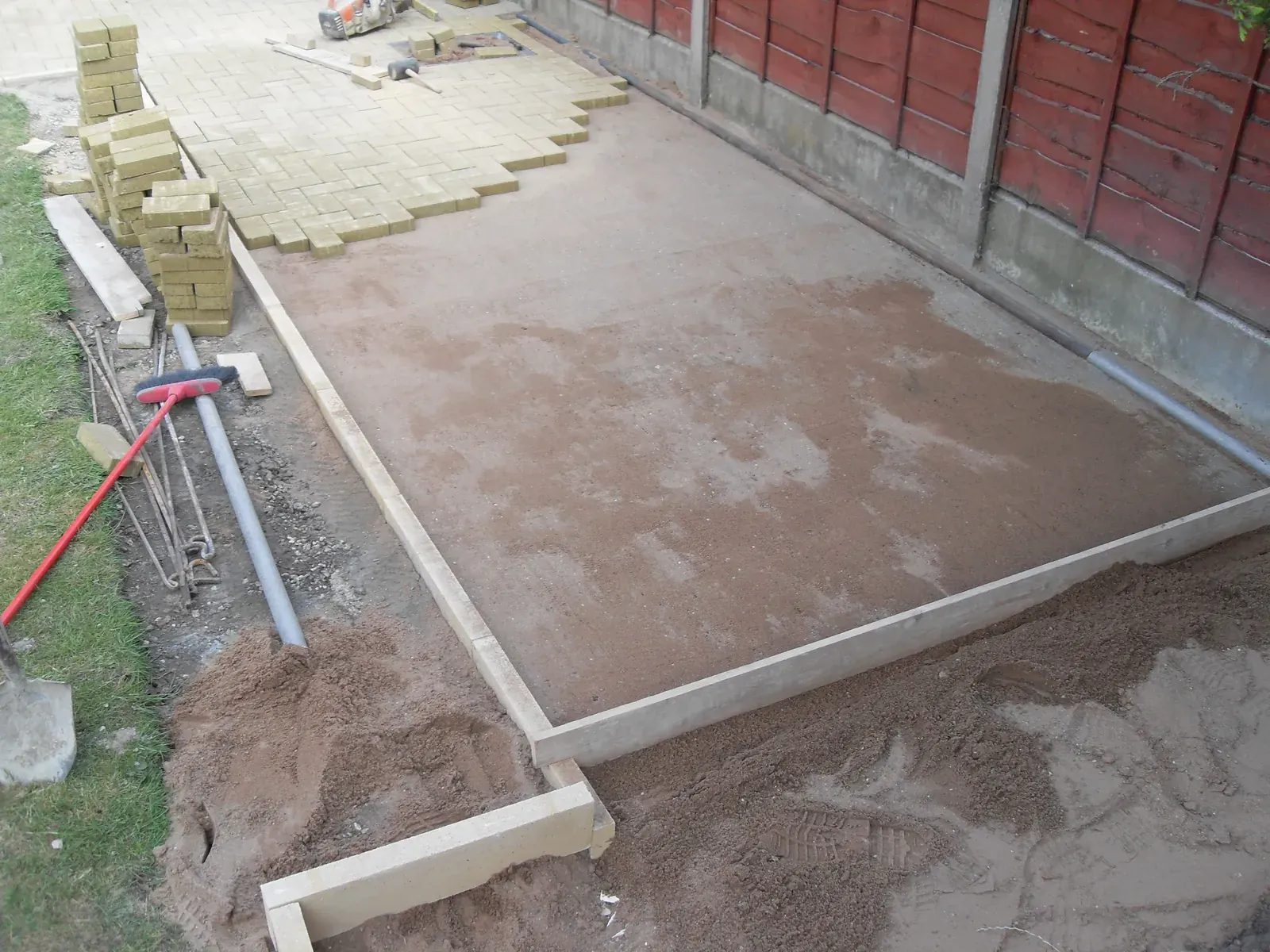 Large concrete base laid and floated in a rear garden