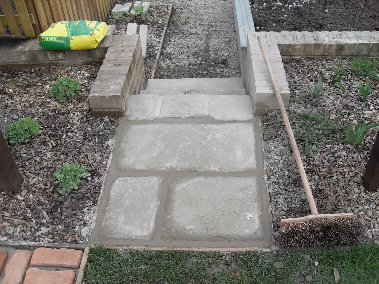 Paved steps built up with timber sleeper edging