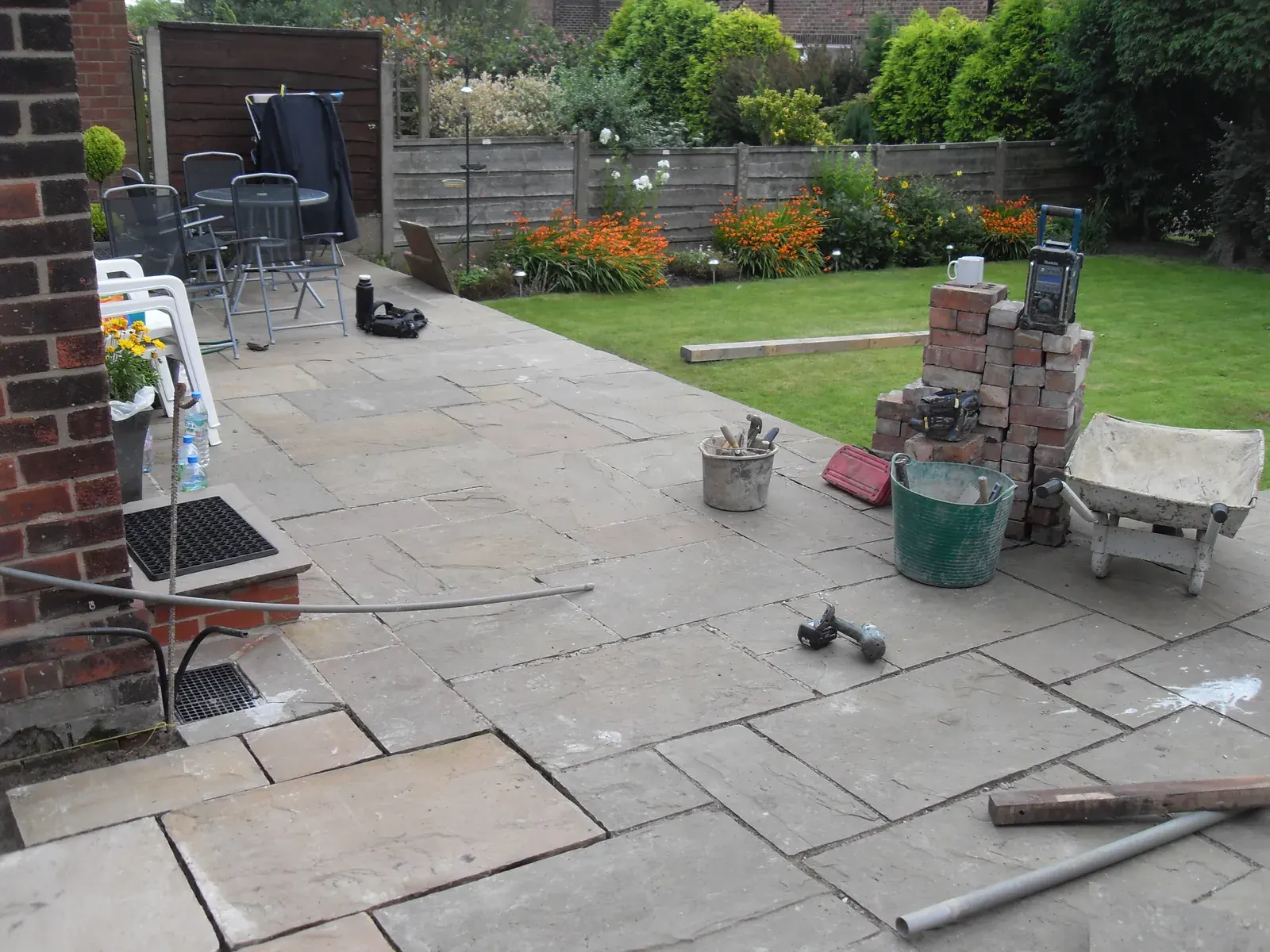 Sandstone paving laid out across a newly landscaped garden